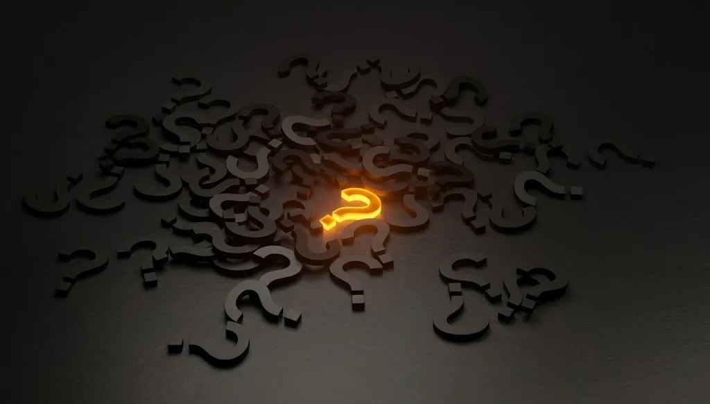 Dark abstract question marks with glowing light